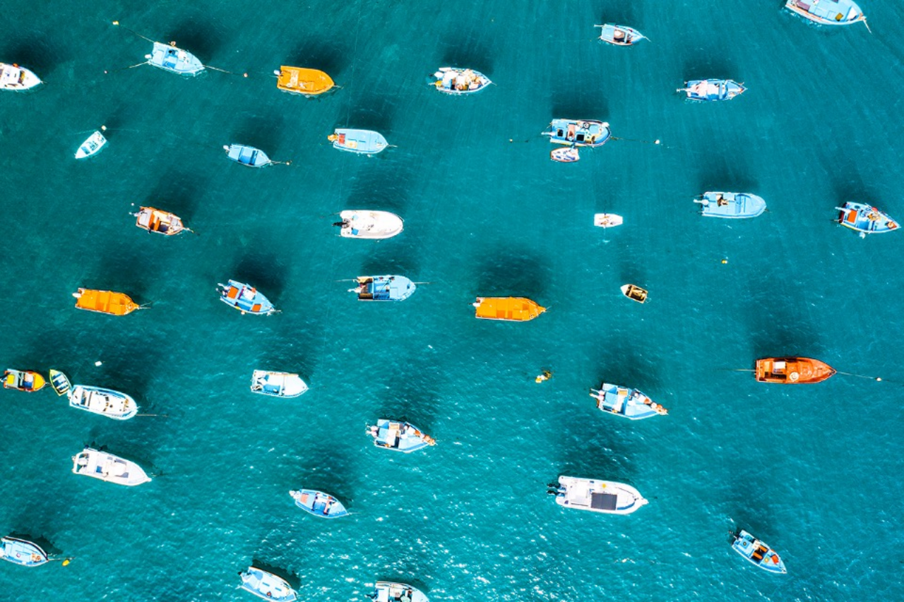 Ocean with small boats